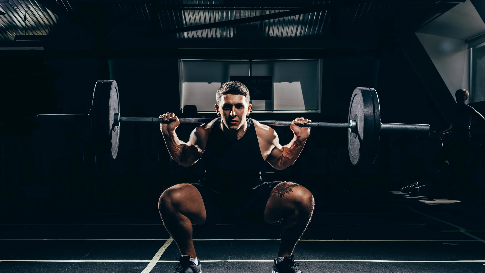 An athlete training under heavy load in the CMS Sports performance gym